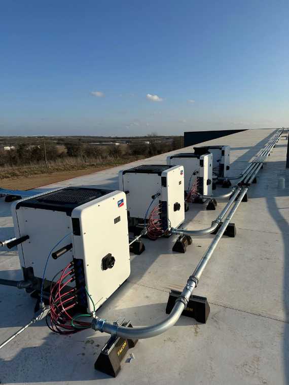 Commercial SMA inverters on a rooftop