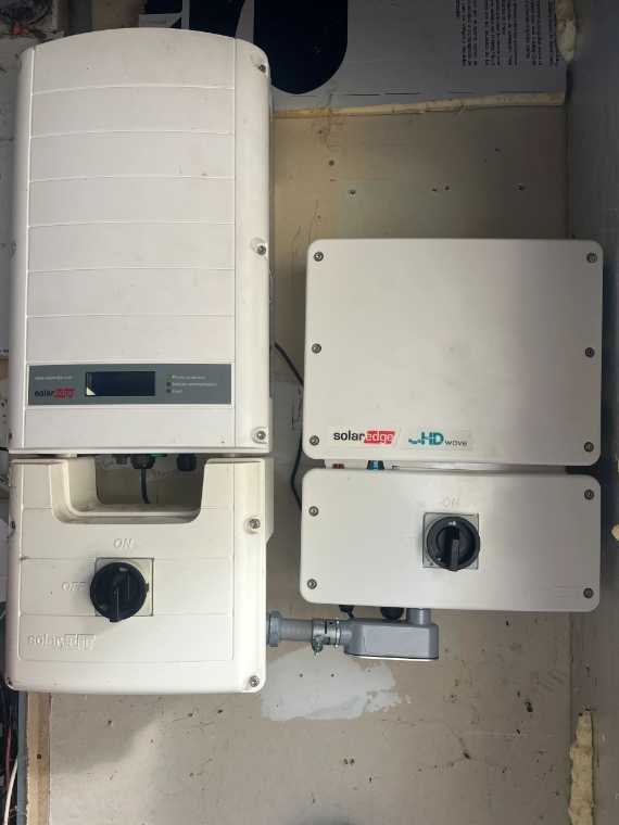 SolarEdge inverters mounted on a wall